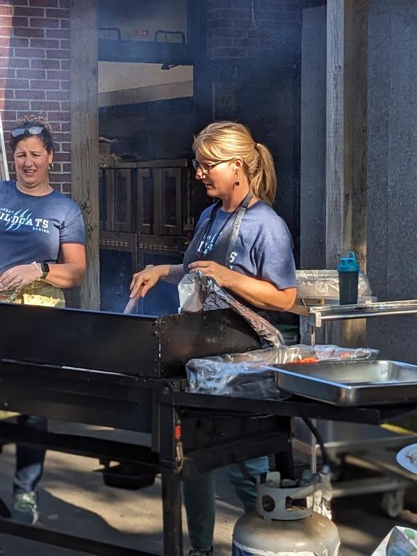 BRES Principal Shawna Kurr cooks on the grill. CANDI JONETH/Boothbay Register