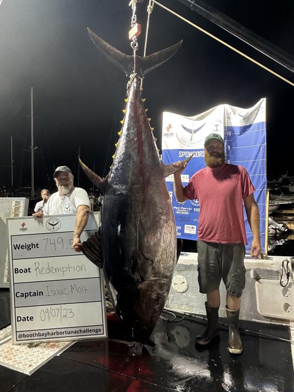 Isaac Molt, right, and Steve Termine with the 749.5-pound tuna that won the 2023 Boothbay Harbor Tuna Challenge. Jax van der Veen photo