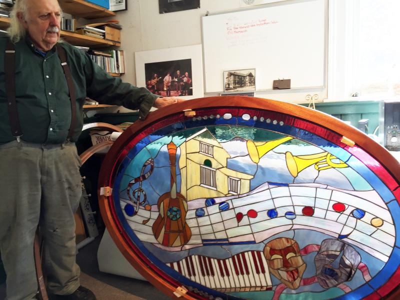 Master stained glass artist Dick Macdonald designed and made the new oval window. File photo