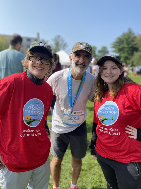 Alain and students (Jayden McInnis and Gabby Dotson and Alain Ollier) at the Maine Marathon. Erica Berman photo