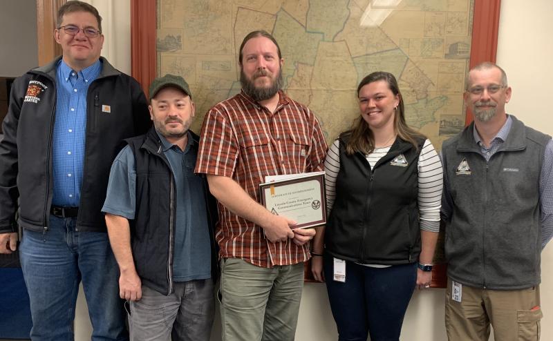 Lincoln County Emergency Management Agency amateur radio has achieved certification as a FEMA-recognized communications team. Pictured, from left, team members Jason Cates and Damon Leibert, Team Leader John Oakes, Assistant Director Emily Huber and Director Maury Prentiss. BILL PEARSON/Boothbay Register