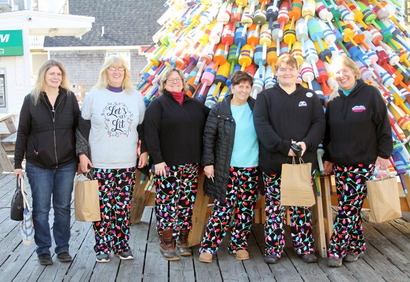 Early Birds gathered ‘round the holiday Pot Buoy Tree on Pier 1 last year. There will be more this year on Saturday, Nov. 18 - maybe even you! File photo