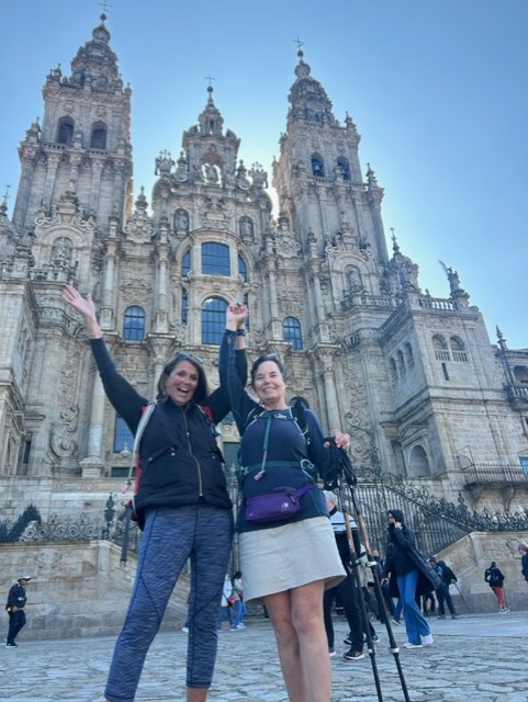 Andrea Neilsen and Lonnie Gisi’s victory photo with the Santiago de Compostela Cathedral in the background. Courtesy photo