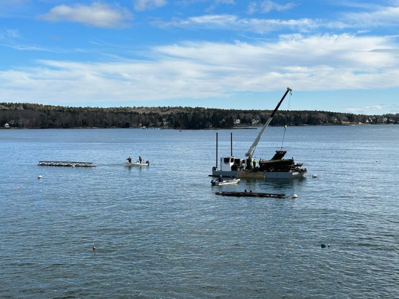 Crew clearing debris ahead of Jan.13 storm. Courtesy of Amy Goodwin, Blake's Boatyard.
