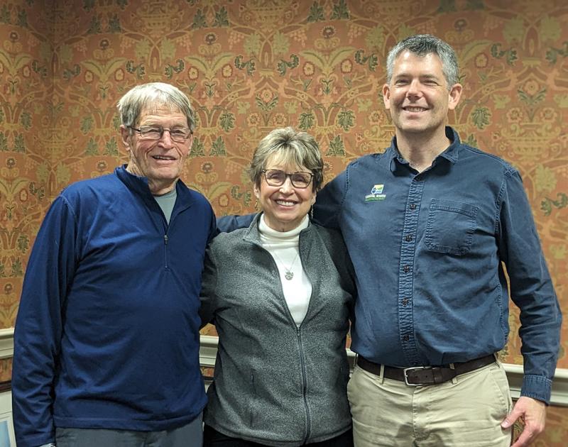 Steve and Karen O’Bryan with Coastal Rivers Executive Director Steven Hufnagel, right, after completing the donation of a conservation easement on the couple’s land in Damariscotta. Courtesy photo