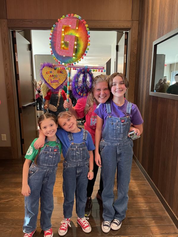 Agatha Harris, Lily Billings, Brianne Martin, and Scout Martin with the Godspell Spirit Stick. Courtesy photo