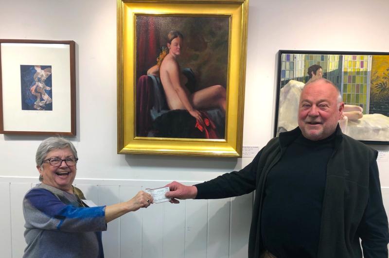 The People’s Choice Award was a tie last year: here Rick Dickinson receives his award from BRAF board member Annette Stormont. Courtesy photo