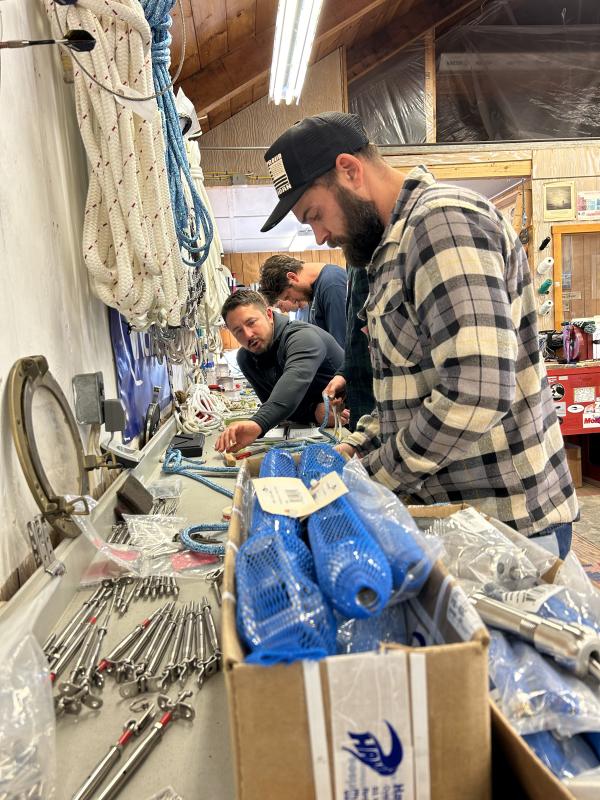 Steve Loughlan offers guidance in braided-rope splicing. JENNY BENNETT/Boothbay Register