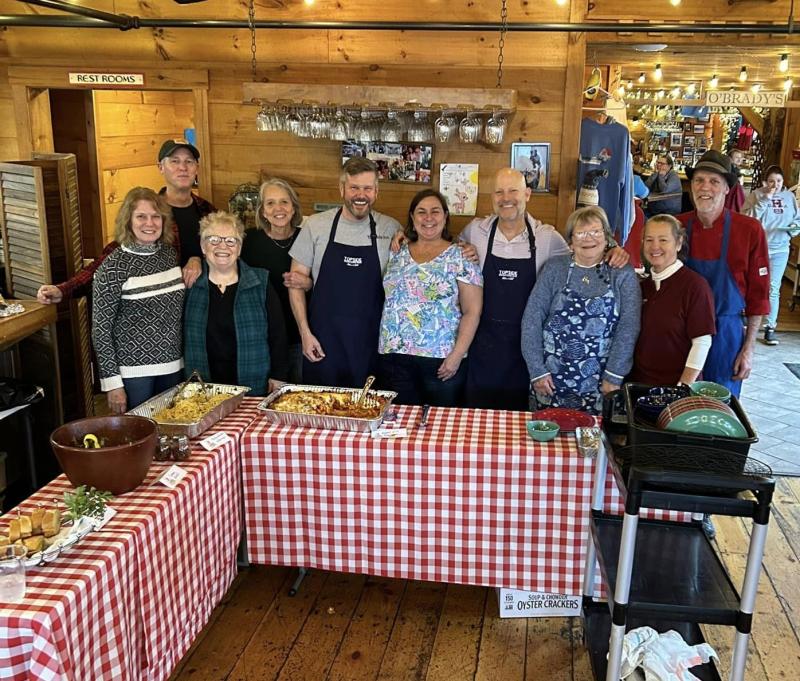 Brady’s volunteers and one of the many host groups at Community Lunch at Brady’s. Courtesy photo