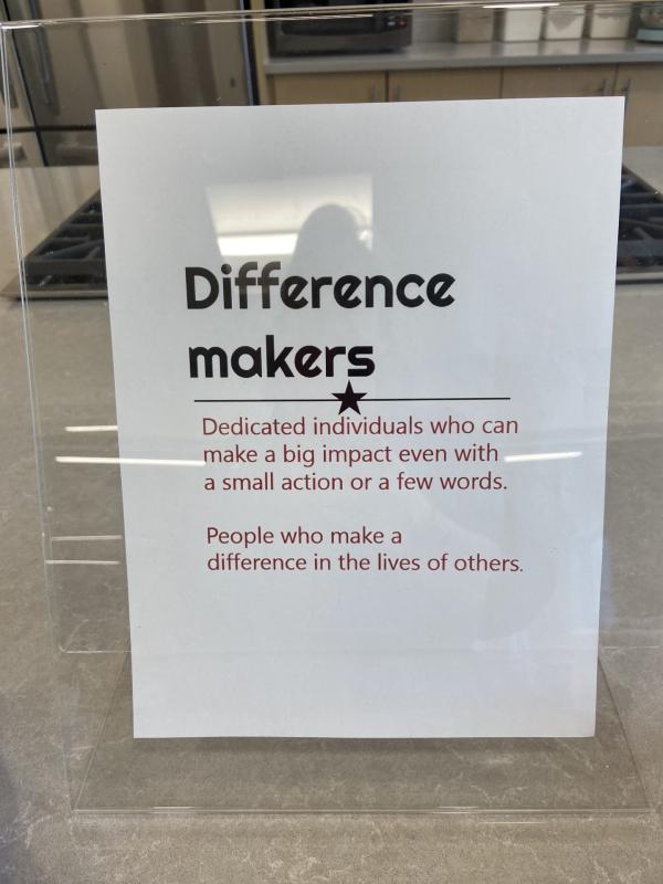 One of the many signs around the room appreciating the staff’s service to the community. Courtesy of BRYMCA