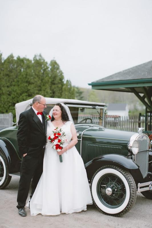 Antique cars and immense indoor and outdoor event spaces offer couples a host of wedding options at Boothbay Railway Village. Megan Clouse Photography photo