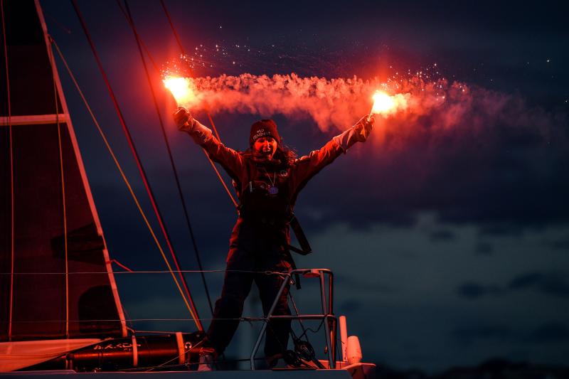 Cole Brauer celebrates finishing her solo sailing race around the world. James Tomlinson photo