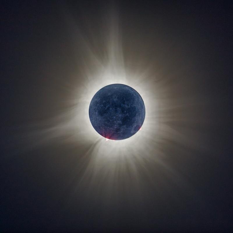 “This ‘Earthshine’ shot is one I have been planning for more than a year. It is made up of nearly 14 images to capture the solar winds, the prominences around the disc and the moon surface. The blue cast comes from the earth being the reflector to light the surface of the moon. The earth is mostly blue which is why the moon surface looks bluish in this scene taken at totality. This was not an easy shot to get and I am happy with my first attempt at Earthshine.” – Michael Leonard
Mike Leonard