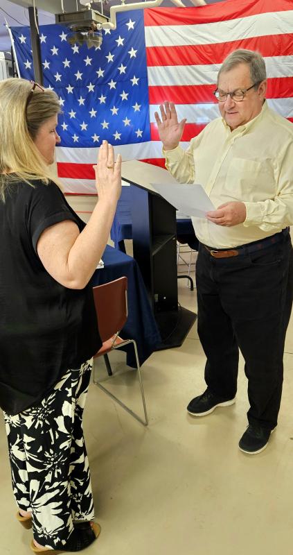 Boothbay Harbor Selectman Ken Rayle is sworn in after town meeting. He was reelected May 3. Michael Tomko photo