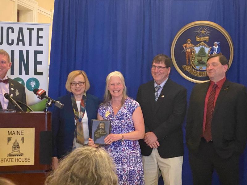 Gov. Janet Mills, far left, with Wiscasset Elementary School’s Becky Hallowell as Hallowell was named Lincoln County teacher of the year May 9. Kim Andersson photo