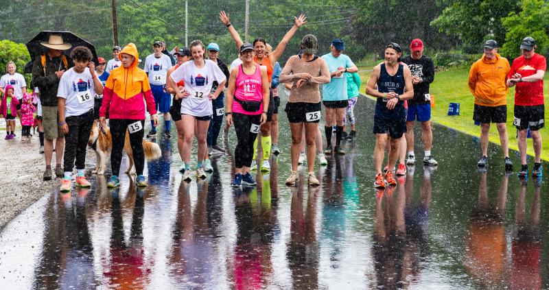 Runners line up in the rain for the 10 kilometer leg of the Edgecomb 250th Birthday Road Race on June 22. Staggered starts included a 10K, 5K, and kids’ run. Bisi Cameron Yee photo