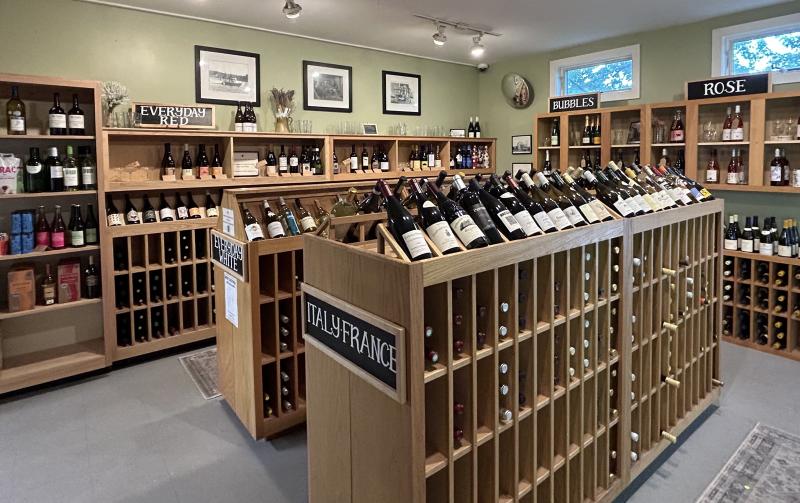 The well-stocked wine cellar offers wines for every taste and budget, every event and celebration. JENNY BENNETT/Boothbay Register