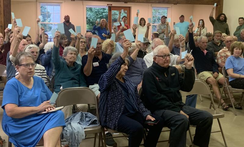 Over 60 Southport residents voted by blue cards July 24 during a special town meeting. BILL PEARSON/Boothbay Register