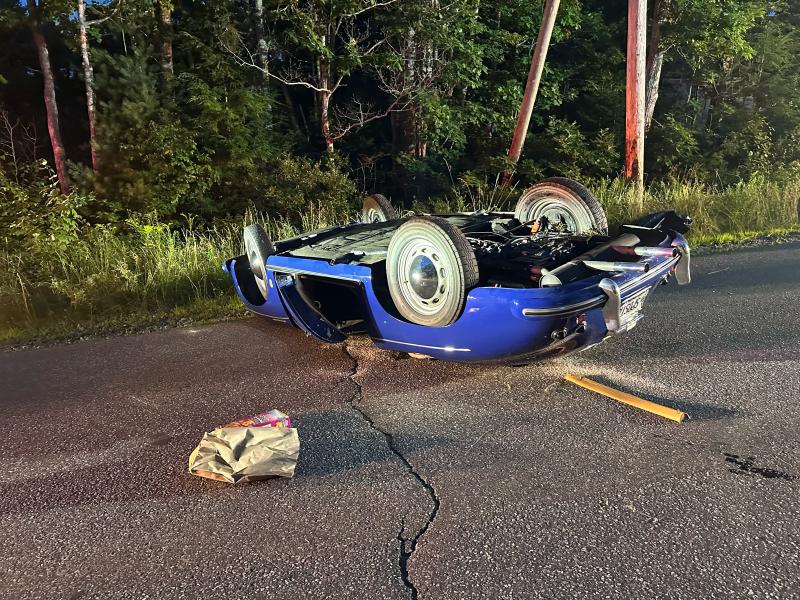 The overturned Porsche on Back Narrows Road on Friday, July 19. Mark Sullivan photo