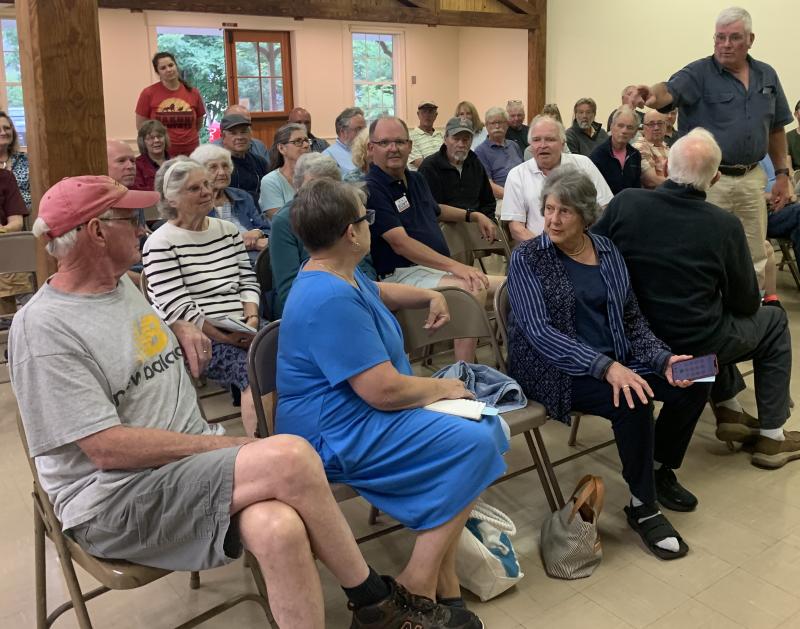 Selectman Gerry Gamage counted registered voters prior to the special town meeting. Southport needed at least 60 for a quorum which delayed the meeting for almost 25 minutes. BILL PEARSON/Boothbay Register