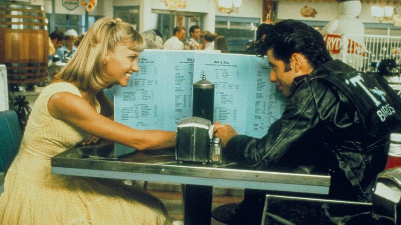 “Grease” screens free and one night only: Sunday, Sept. 1. And there’s a 50s costume contest, games, drive in photo booths... more! All at the Harbor Theater. Courtesy of the venue