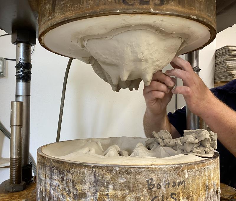 AE Ceramics uses a RAM press for many of the business’ bowl and plate designs. ISABELLE CURTIS/Boothbay Register