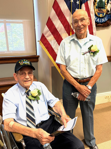 Stanley Hodgdon, right, and a fellow Korean War veteran meet in the Governor’s Cabinet Room. Courtesy of Sarah Sherman