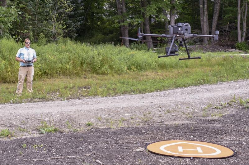 Local surveyor Nicholas Plumer operates a drone with a LiDAR system during a land survey. FRITZ FREUDENBERGER/Boothbay Register