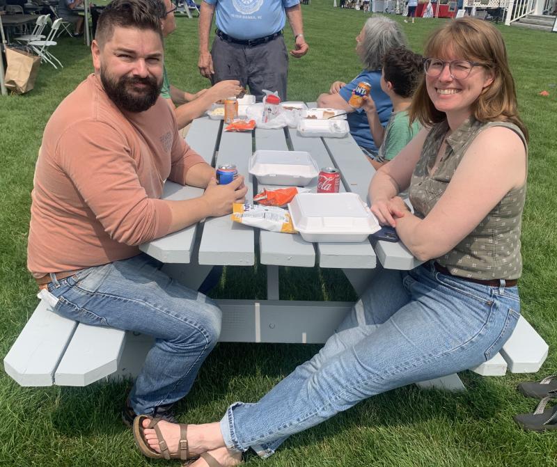 Fritz Freudenberger and Bailey Cunningham, both of Edgecomb, enjoy the barbecue Aug. 17 at V.E.T.S. Inc. fundraiser held at Boothbay Common. BILL PEARSON/Boothbay Register