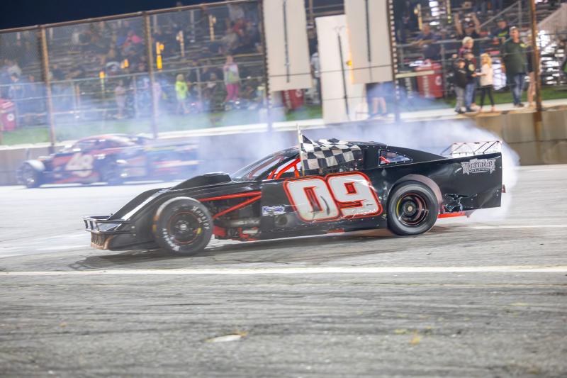Sylas Ripley does a burnout on the front stretch after scoring his first career Modified win at Wiscasset Speedway. Jasen Dickey Photography