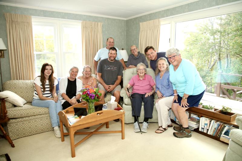Evelyn Luther Pratt Sherman holds the Boston Post Cane surrounded by her family — Kali Andrews, Cory Chase, Anne Thompson Maher (cousin), Jack Sherman (grandson), Jerry McGrail (son-in-law), Mary Lou Thompson Koskela (cousin), Jake Brewer (grandson), Sarah Sherman (daughter), and Susan Jellison (daughter). Robert Mitchell photo Evelyn Luther Pratt Sherman holds the Boston Post Cane surrounded by her family — Kali Andrews, Cory Chase, Anne Thompson Maher (cousin), Jack Sherman (grandson), Jerry McGrail (son-in-law), Mary Lou Thompson Koskela (cousin), Jake Brewer (grandson), Sarah Sherman (daughter), and Susan Jellison (daughter). Robert Mitchell photo