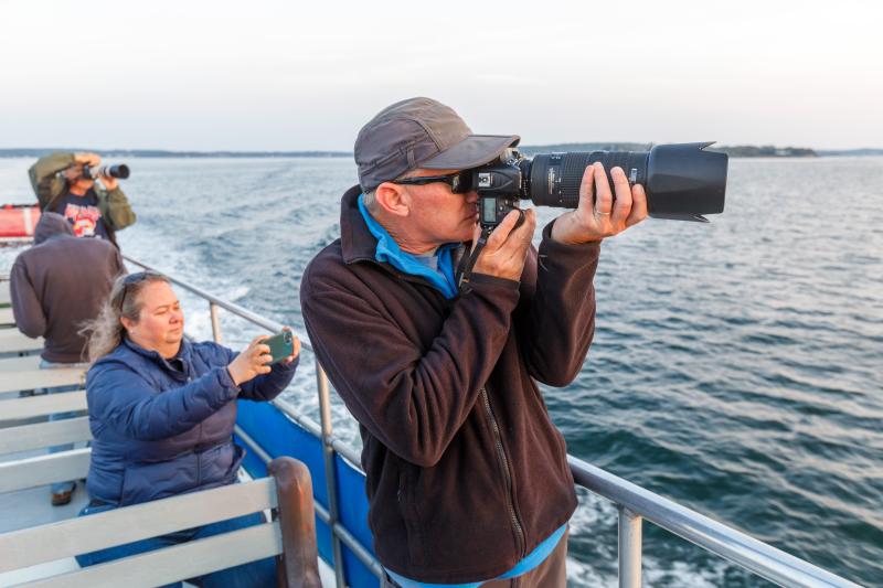 Taking photos on the Sept. 14 Sunrise Lighthouse Photography cruise. Mike Leonard photo