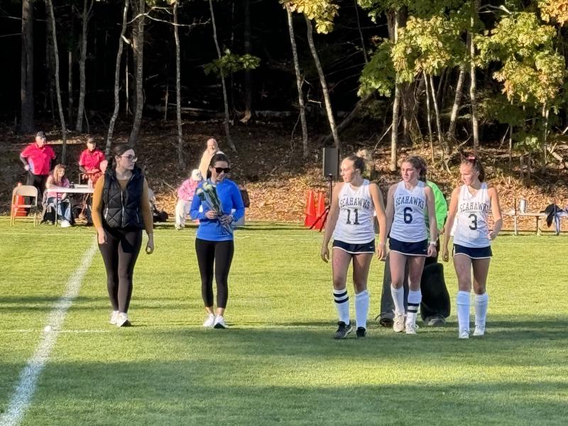 Coaches Taylor Walby and Jax van der Veen and the senior players. Rob Watts photo Field hockey seniors