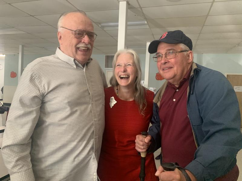 2025 Maine Teacher of the Year Becky Hallowell, who teaches fourth grade at Wiscasset Elementary School, is flanked by her uncles Michael “Jim” Bilinsky, left, and Daniel Fortin at a reception after Hallowell learned she’d won the statewide honor. SUSAN JOHNS/Wiscasset Newspaper 2025 Maine Teacher of the Year Becky Hallowell, who teaches fourth grade at Wiscasset Elementary School, is flanked by her uncles Michael “Jim” Bilinsky, left, and Daniel Fortin at a reception after Hallowell learned she’d won the statewide honor. SUSAN JOHNS/Wiscasset Newspaper