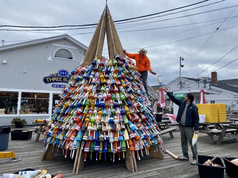 Volunteers assemble the buoy tree in preparation for the annual Boothbay Lights celebrations. The tree consists of about 800 wooden pot buoys. ISABELLE CURTIS/Boothbay Register ISABELLE CURTIS/Boothbay Register
