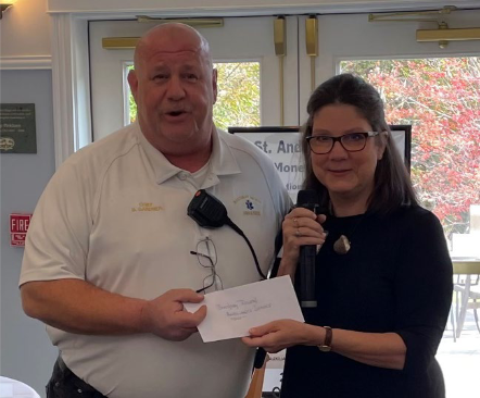 Dan Gardner, Boothbay Region Ambulance Service, accepted a check in the amount of $5,000. Courtesy photo Dan
