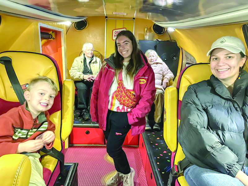 Passengers get ready for a ride to Gardens Aglow. FRITZ FREUDENBERGER/Boothbay Register Wienermobile passengers