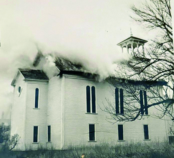 Smoke billows from the original church on Jan. 26, 1951. Courtesy of First United Methodist Church Smoke billows from within. Courtesy of the First United Methodist Church
