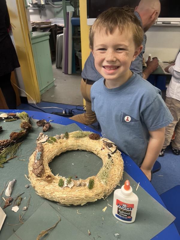 Happy wreath maker. Courtesy of Eileen Higgins Wreath maker
