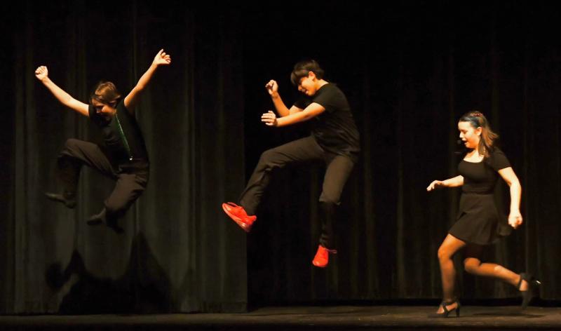 Scout Martin, Collin Cantillo, and Kyleigh Cole bell kick at the end of their performance of "Fame & Fortune" from Rudolph. Scout Martin, Collin Cantillo, and Kyleigh Cole bell kick at the end of their performance of "Fame & Fortune" from Rudolph.