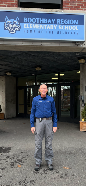 BHPD Office Larry Brown nears his 13th year as School Resource Officer at Boothbay Region Elementary and High schools. Courtesy of Larry Brown Boothbay Harbor police officer Larry Brown stands in front of BRES.