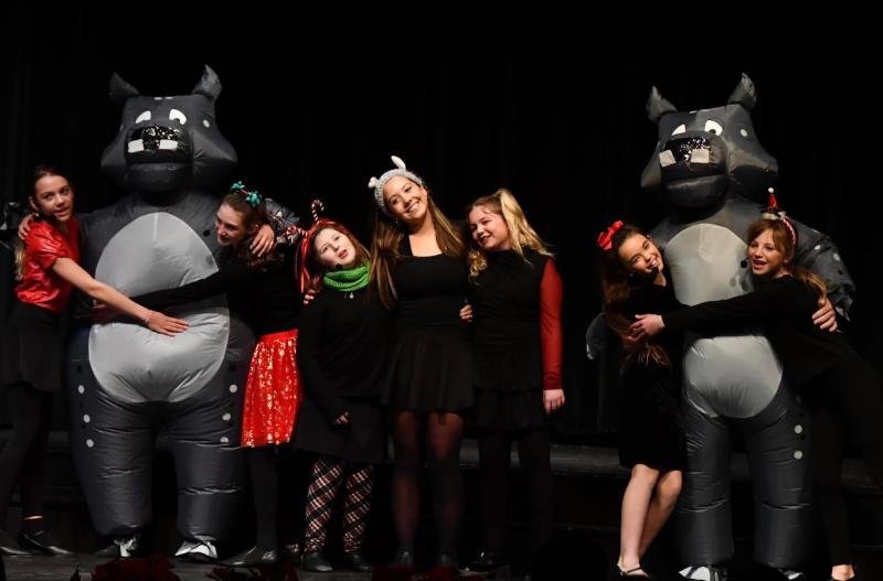 Enilea Burns, Evie Roy, Harper Westhaver, Violet Baldwin, Adeline Inman, and Kaylee Wayda sing "I Want A Hippopotamus for Christmas" with hippo dancers, Hamilton Pierpan, Sarah Harris, and Collin Cantillo. Enilea Burns, Evie Roy, Harper Westhaver, Violet Baldwin, Adeline Inman, and Kaylee Wayda sing "I Want A Hippopotamus for Christmas" with hippo dancers, Hamilton Pierpan, Sarah Harris, and Collin Cantillo.