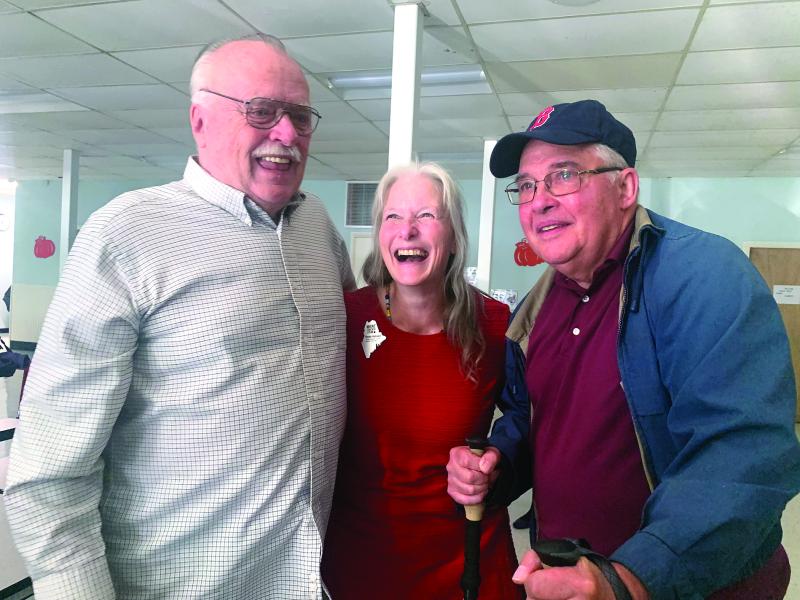 2025 Maine Teacher of the Year Becky Hallowell, who teaches fourth grade at Wiscasset Elementary School, is flanked by her uncles Michael “Jim” Bilinsky, left, and Daniel Fortin Oct. 10 at a reception after Hallowell learned she’d won the statewide honor. SUSAN JOHNS/Wiscasset Newspaper 2025 Maine Teacher of the Year Becky Hallowell, who teaches fourth grade at Wiscasset Elementary School, is flanked by her uncles Michael “Jim” Bilinsky, left, and Daniel Fortin Oct. 10 at a reception after Hallowell learned she’d won the statewide honor. SUSAN JOHNS/Wiscasset Newspaper