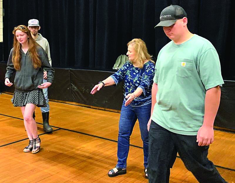 In Stover Auditorium during marching practice May 31, Debra Pooler shows seniors where to be. SUSAN JOHNS/Wiscasset Newspaper In Stover Auditorium during marching practice May 31, Debra Pooler shows seniors where to be. SUSAN JOHNS/Wiscasset Newspaper