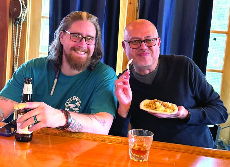 Chef John Asendorf and Byron Cortez enjoy the mac and cheese. Jen Mitchell photo Chef John Asendorf and Byron Cortez enjoy the mac and cheese. Jen Mitchell photo