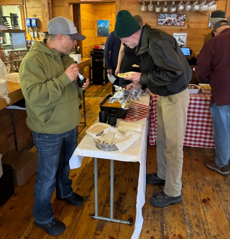 Jose Rivera and Scott Edwards try samples and vote for People's Choice. Jen Mitchell photo Jose Rivera and Scott Edwards try samples and vote for People's Choice. Jen Mitchell photo