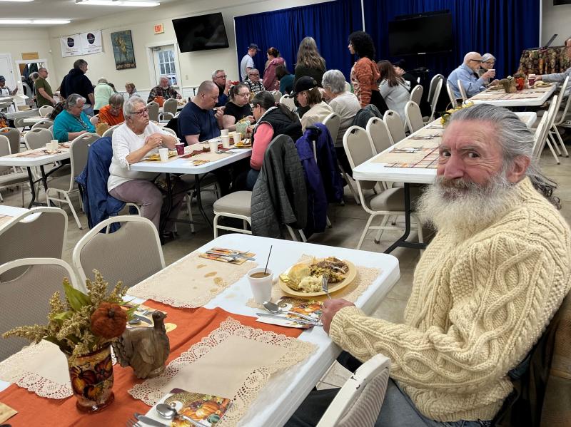 Vietnam veteran Phillip Tauber of East Boothbay enjoys Thanksgiving dinner. Courtesy of David Patch Phillip Tauber