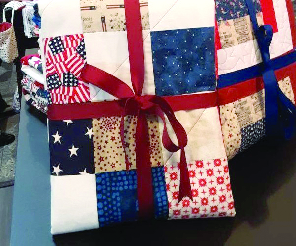 Red, white and blue quilts made by Southport Island quilters. JANE CARPENTER/Boothbay Register Red, white and blue quilts made by Southport Island quilters. JANE CARPENTER/Boothbay Register