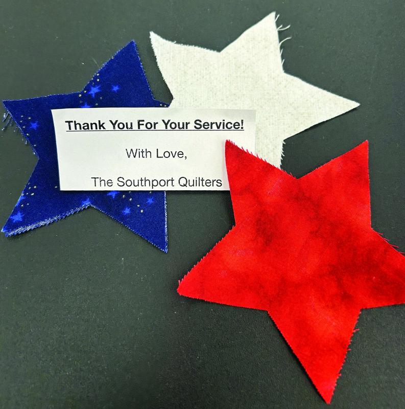 Red, white and blue stars and a big "Thank You" note accompanied each quilt made by Southport Island quilters for veterans at Cabin in the Woods. Courtesy photo Red, white and blue stars and a big "Thank You" note accompanied each quilt made by Southport Island quilters for veterans at Cabin in the Woods. Courtesy photo