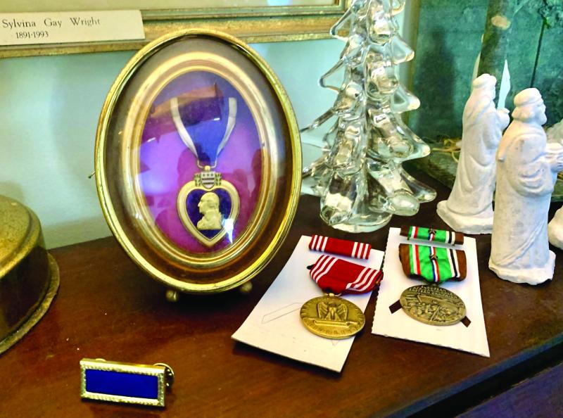 The original 1944 Purple Heart and some of the new medals awarded posthumously to Elmer Wright for his service in WWII. ISABELLE CURTIS/Boothbay Register The original 1944 Purple Heart and some of the new medals awarded posthumously to Elmer Wright for his service in WWII. ISABELLE CURTIS/Boothbay Register